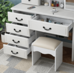 dressing table, dressing tables, vanity table, vanity desk, makeup table, makeup vanity, bedroom dressing table, bedroom vanity table, modern dressing table, modern vanity table, elegant dressing table, stylish dressing table, contemporary dressing table, luxury dressing table, premium dressing table, wooden dressing table, MDF dressing table, bedroom furniture, bedroom furniture Kenya, dressing room table, dressing station, makeup station, beauty table, beauty vanity, cosmetic table, cosmetic vanity, ladies dressing table, women's dressing table, ladies vanity table, bedroom vanity, home vanity table, home dressing table, dressing cabinet, vanity cabinet, dressing table with mirror, dressing table mirror, vanity table with mirror, makeup table with mirror, dressing table with drawers, dressing table with storage, vanity table with drawers, vanity table with storage, makeup vanity with drawers, dressing table organizer, vanity organizer, cosmetic organizer table, jewelry storage table, bedroom storage table, compact dressing table, small dressing table, large dressing table, spacious dressing table, corner dressing table, wall mounted dressing table, floating dressing table, freestanding dressing table, portable dressing table, space saving dressing table, multifunctional dressing table, functional dressing table, practical dressing table, durable dressing table, quality dressing table, affordable dressing table, luxury vanity furniture, premium vanity furniture, bedroom vanity furniture, modern bedroom furniture, contemporary bedroom furniture, home bedroom furniture, dressing room furniture
