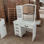 dressing table, dressing tables, vanity table, vanity desk, makeup table, makeup vanity, bedroom dressing table, bedroom vanity table, modern dressing table, modern vanity table, elegant dressing table, stylish dressing table, contemporary dressing table, luxury dressing table, premium dressing table, wooden dressing table, MDF dressing table, bedroom furniture, bedroom furniture Kenya, dressing room table, dressing station, makeup station, beauty table, beauty vanity, cosmetic table, cosmetic vanity, ladies dressing table, women's dressing table, ladies vanity table, bedroom vanity, home vanity table, home dressing table, dressing cabinet, vanity cabinet, dressing table with mirror, dressing table mirror, vanity table with mirror, makeup table with mirror, dressing table with drawers, dressing table with storage, vanity table with drawers, vanity table with storage, makeup vanity with drawers, dressing table organizer, vanity organizer, cosmetic organizer table, jewelry storage table, bedroom storage table, compact dressing table, small dressing table, large dressing table, spacious dressing table, corner dressing table, wall mounted dressing table, floating dressing table, freestanding dressing table, portable dressing table, space saving dressing table, multifunctional dressing table, functional dressing table, practical dressing table, durable dressing table, quality dressing table, affordable dressing table, luxury vanity furniture, premium vanity furniture, bedroom vanity furniture, modern bedroom furniture, contemporary bedroom furniture, home bedroom furniture, dressing room furniture
