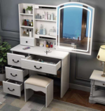 dressing table, dressing tables, vanity table, vanity desk, makeup table, makeup vanity, bedroom dressing table, bedroom vanity table, modern dressing table, modern vanity table, elegant dressing table, stylish dressing table, contemporary dressing table, luxury dressing table, premium dressing table, wooden dressing table, MDF dressing table, bedroom furniture, bedroom furniture Kenya, dressing room table, dressing station, makeup station, beauty table, beauty vanity, cosmetic table, cosmetic vanity, ladies dressing table, women's dressing table, ladies vanity table, bedroom vanity, home vanity table, home dressing table, dressing cabinet, vanity cabinet, dressing table with mirror, dressing table mirror, vanity table with mirror, makeup table with mirror, dressing table with drawers, dressing table with storage, vanity table with drawers, vanity table with storage, makeup vanity with drawers, dressing table organizer, vanity organizer, cosmetic organizer table, jewelry storage table, bedroom storage table, compact dressing table, small dressing table, large dressing table, spacious dressing table, corner dressing table, wall mounted dressing table, floating dressing table, freestanding dressing table, portable dressing table, space saving dressing table, multifunctional dressing table, functional dressing table, practical dressing table, durable dressing table, quality dressing table, affordable dressing table, luxury vanity furniture, premium vanity furniture, bedroom vanity furniture, modern bedroom furniture, contemporary bedroom furniture, home bedroom furniture, dressing room furniture