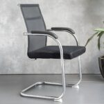 Black Mesh Cantilever Office Chair This Black Mesh Cantilever Office Chair is a stylish and practical seating solution designed for modern offices, meeting rooms, reception areas, and visitor spaces. Featuring a breathable black mesh backrest, cushioned seat, supportive armrests, and a sturdy chrome-plated cantilever frame, this chair delivers a comfortable seating experience with a clean professional appearance. Key Features Breathable Mesh Backrest – Promotes airflow and helps keep you comfortable during extended sitting. Comfortable Padded Seat – Provides supportive cushioning for office and meeting use. Ergonomic Back Support – Contoured backrest helps provide comfortable upper-body support. Integrated Armrests – Offers convenient support for the arms while seated. Strong Chrome Cantilever Frame – Provides stability, durability, and a modern appearance. Non-Swivel Design – Stable fixed seating, ideal for meetings and visitor areas. Modern Black Finish – Easily complements a wide range of office interiors. Professional Appearance – Creates a smart and welcoming look for business environments. Versatile Use – Suitable for boardrooms, conference rooms, reception areas, offices, and waiting spaces. Easy to Maintain – Mesh upholstery and smooth metal surfaces are simple to clean. Ideal For Boardrooms • Meeting Rooms • Reception Areas • Visitor Seating • Executive Offices • Waiting Areas • Conference Rooms • Training Rooms