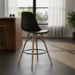 Black Plastic Eames Barstool, Eames barstool, black Eames barstool, plastic Eames barstool, Eames style barstool, mid century barstool, mid century modern barstool, modern barstool, black barstool, plastic barstool, molded plastic barstool, bucket barstool, Eames stool, black plastic stool, high bar stool, kitchen island stool, counter stool, bar stool Kenya, barstool Nairobi, kitchen stool Kenya, modern stool Kenya, dining barstool, breakfast bar stool, tall bar chair, modern bar chair, black bar chair, plastic bar chair, ergonomic barstool, stylish bar stool, durable bar stool, sturdy barstool, minimalist barstool, contemporary barstool, Scandinavian barstool, retro barstool, iconic barstool, designer barstool, modern home seating, kitchen seating, bar seating, cafe stool, restaurant barstool, commercial barstool, bistro stool, pub stool, event seating, hospitality seating, lounge barstool, office barstool, breakroom stool, high counter chair, wooden leg barstool, Eiffel barstool, metal leg barstool, chrome frame barstool, wire base barstool, black shell chair, molded bucket stool, comfortable barstool, easy clean stool, low maintenance bar stool, light weight stool, compact barstool, space saving stool, home bar stool, indoor barstool, patio bar stool, outdoor barstool, dining furniture Kenya, kitchen furniture Nairobi, home furniture Kenya, office furniture Kenya, modern furniture Nairobi, commercial furniture Kenya, affordable barstool Kenya, quality barstool Kenya, premium barstool, luxury barstool, trendy barstool, stylish seating, aesthetic barstool, interior design stool, modern kitchen decor, home bar furniture, restaurant furniture Nairobi, cafe seating Kenya, counter height stool, bar height stool, tall kitchen chair, black kitchen chair, plastic counter stool, black counter chair, Eames counter stool, Eames style chair, iconic design stool, Black Plastic Eames Barstool Kenya.