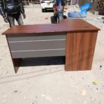 1400mm Curved Office Desk, 1400mm office desk, 1.4m office desk, 1400mm curved desk, curved office desk, curved office workstation, curved desk Kenya, curved office desk Nairobi, modern office desk, modern curved desk, executive office desk, executive workstation, office workstation, professional office desk, corporate office desk, managerial office desk, staff office desk, computer office desk, computer workstation, work desk Kenya, office desk Kenya, office furniture Kenya, office furniture Nairobi, workstation Kenya, workstation Nairobi, modern office furniture, contemporary office desk, contemporary office furniture, stylish office desk, sleek office workstation, ergonomic office desk, ergonomic workstation, spacious office desk, compact office desk, 1.4 meter desk, 140cm office desk, 140cm curved desk, curved workstation Kenya, curved desk Nairobi, office work table, office table Kenya, office table Nairobi, business office desk, commercial office desk, corporate workstation, employee workstation, staff workstation, administrative workstation, clerical office desk, manager workstation, private office desk, home office desk, work from home desk, home office workstation, computer desk Kenya, laptop workstation, office computer table, professional workstation desk, durable office desk, sturdy office workstation, quality office desk Kenya, affordable office desk Kenya, custom office desk, customized office furniture, office workspace furniture, workplace desk, productivity workstation, modern workspace furniture, minimalist office desk, contemporary workstation, business furniture Kenya, corporate furniture Kenya, executive furniture Kenya, office desk supplier Kenya, office furniture supplier Nairobi, office storage desk, functional office desk, practical office workstation, space efficient desk, space saving office desk, reception office desk, consultation desk, customer service desk, administrative desk, workstation table, modern work table, office work station, 1400mm workstation, 1400mm curved workstation, 1400mm executive desk, 1400mm office workstation, modern curved office desk, 1400mm Curved Office Desk Kenya.