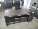 1800mm Grey L-Shaped Desk, 1800mm L-shaped desk, grey L-shaped desk, 1.8m L-shaped desk, L-shaped office desk, L-shaped executive desk, L-shaped workstation, grey office desk, grey executive desk, executive office desk, modern office desk, office workstation, corner office desk, corner workstation, large office desk, spacious office desk, 1800mm office desk, 1800mm executive desk, 1800mm workstation, 1.8m office desk, 1.8 meter desk, grey workstation, modern L-shaped workstation, contemporary office desk, professional office desk, corporate office desk, manager office desk, executive workstation, managerial desk, director office desk, CEO office desk, business office desk, office furniture Kenya, office desk Kenya, office furniture Nairobi, office desk Nairobi, L-shaped desk Kenya, L-shaped desk Nairobi, workstation Kenya, workstation Nairobi, modern furniture Kenya, modern office furniture, corporate furniture Kenya, executive furniture Kenya, ergonomic office desk, ergonomic workstation, spacious workstation, productive workspace, office workspace furniture, workplace desk, business workstation, employee workstation, manager workstation, private office desk, executive office furniture, contemporary office furniture, grey office furniture, grey desk Kenya, grey workstation Kenya, corner desk Kenya, corner desk Nairobi, office corner desk, space saving office desk, space efficient workstation, large L-shaped workstation, multi-purpose office desk, computer workstation desk, computer office desk, laptop workstation, office computer desk, professional workstation desk, durable office desk, sturdy workstation, quality office desk Kenya, affordable office desk Kenya, custom office furniture, office storage desk, executive work desk, executive office workstation, modern executive desk, sleek office desk, stylish office workstation, minimalist office desk, contemporary workstation, corporate workstation, business office furniture, commercial office desk, administrative workstation, clerical office desk, home office L-shaped desk, home office workstation, work from home desk, 1800mm L-shaped workstation, grey executive workstation, 1800mm Grey L-Shaped Desk Kenya.