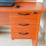 100CM Customized Home Office Desk, 100cm home office desk, 100cm desk, 1 meter office desk, 1m home office desk, customized home office desk, custom home office desk, customized office desk, custom desk, 100cm computer desk, 100cm study desk, 100cm writing desk, compact home office desk, small home office desk, space saving home office desk, customized study desk, custom computer table, 100cm desk Kenya, 100cm desk Nairobi, home office desk Kenya, home office desk Nairobi, custom furniture Kenya, custom furniture Nairobi, customized office desk Kenya, customized desk Nairobi, work from home desk, WFH office desk, study table for home, computer table for home, small space computer desk, compact study table, custom wood desk, customized wooden desk, modern home office desk, modern 100cm desk, sleek home office desk, minimalist study desk, customized workspace desk, personalized office desk, bespoke office desk, tailored home office desk, custom dimensions desk, small writing desk, apartment computer desk, bedroom study desk, student desk Kenya, home study table, home office furniture Kenya, home office furniture Nairobi, office furniture Kenya, office furniture Nairobi, modern office desk, functional home desk, durable study desk, sturdy computer desk, high quality custom desk, affordable home office desk, customized desk supplier Kenya, local custom furniture Kenya, space efficient desk, small office workstation, compact computer workstation, home workstation desk, personal work desk, laptop table for home, laptop desk 100cm, PC desk 100cm, writing table 100cm, customized table Nairobi, custom desk design, made to order office desk, customized work table, small study desk Nairobi, compact desk Kenya, minimalist computer table, clean desk setup, office workspace table, stylish home desk, contemporary home office desk, quality home office desk, custom desk builder Kenya, custom office workspace, home office seating desk, compact office furniture, small apartment desk, study room table, home office study desk, customized home office desk Kenya.