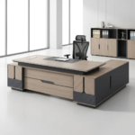 240CM Solid Executive Desk  Command the room with the 240CM Solid Executive Desk, a massive statement piece engineered for senior executives, directors, and leaders who require maximum surface space and refined elegance. Spanning an expansive 2.4 meters, this high-end desk balances luxurious design with structural durability to transform any corporate suite or spacious home office. Key Features Expansive 240cm Surface: Offers immense workspace for multiple monitors, conference call setups, and extensive document organization. Solid Heavy-Duty Construction: Built with premium high-density materials to ensure long-lasting stability, strength, and durability. Built-in Storage Solutions: Includes integrated drawers, side cabinets, and lockable compartments to keep confidential files organized. Integrated Wire Management: Built-in grommets and cable channels keep power cords hidden and clutter-free. Polished Professional Finish: Features rich wood grain textures and smooth edge detailing for an authoritative corporate aesthetic. Designed for Leadership & Productivity A expansive desk creates a clear and structured work process. The 240CM Solid Executive Desk provides ample space to host small face-to-face discussions, review large blueprints, or manage multi-screen digital workflows simultaneously. Its ergonomic layout ensures all essential tools remain within easy reach while maintaining a clean, clutter-free desktop. Premium Craftsmanship for High-Impact Offices Crafted to serve as the focal point of executive suites, this desk combines traditional authority with modern office functionality. The sturdy frame supports heavy office equipment effortlessly, while the rich finish protects against daily wear, scratches, and stains—preserving its professional look for years to come. Ideal Applications Executive and C-Suite office suites Boardrooms and management offices Spacious home office setups Law firms and financial consulting offices Government and institutional leadership suites
