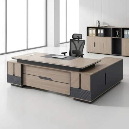 240CM Solid Executive Desk  Command the room with the 240CM Solid Executive Desk, a massive statement piece engineered for senior executives, directors, and leaders who require maximum surface space and refined elegance. Spanning an expansive 2.4 meters, this high-end desk balances luxurious design with structural durability to transform any corporate suite or spacious home office. Key Features Expansive 240cm Surface: Offers immense workspace for multiple monitors, conference call setups, and extensive document organization. Solid Heavy-Duty Construction: Built with premium high-density materials to ensure long-lasting stability, strength, and durability. Built-in Storage Solutions: Includes integrated drawers, side cabinets, and lockable compartments to keep confidential files organized. Integrated Wire Management: Built-in grommets and cable channels keep power cords hidden and clutter-free. Polished Professional Finish: Features rich wood grain textures and smooth edge detailing for an authoritative corporate aesthetic. Designed for Leadership & Productivity A expansive desk creates a clear and structured work process. The 240CM Solid Executive Desk provides ample space to host small face-to-face discussions, review large blueprints, or manage multi-screen digital workflows simultaneously. Its ergonomic layout ensures all essential tools remain within easy reach while maintaining a clean, clutter-free desktop. Premium Craftsmanship for High-Impact Offices Crafted to serve as the focal point of executive suites, this desk combines traditional authority with modern office functionality. The sturdy frame supports heavy office equipment effortlessly, while the rich finish protects against daily wear, scratches, and stains—preserving its professional look for years to come. Ideal Applications Executive and C-Suite office suites Boardrooms and management offices Spacious home office setups Law firms and financial consulting offices Government and institutional leadership suites