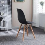 Black Eames Plastic Chair, black plastic chair, Eames plastic chair, black Eames chair, Eames style plastic chair, black Eiffel chair, Eames molded plastic chair, modern plastic chair, black dining chair, iconic plastic chair, Mid-Century modern chair, Eames side chair, black molded chair, designer plastic chair, modern accent chair, black office chair, stylish dining chair, contemporary plastic chair, durable plastic chair, black accent chair, minimalist plastic chair, Eames replica chair, black shell chair, plastic armchair, black armchair, ergonomic plastic chair, modern cafe chair, restaurant plastic chair, commercial seating, black visitor chair, black reception chair, home office chair, desk chair, study chair, vanity chair, living room accent chair, dining room chair, retro plastic chair, molded shell chair, wooden leg plastic chair, Eiffel leg chair, metal leg plastic chair, stylish home seating, premium plastic chair, compact plastic chair, versatile seating, indoor plastic chair, outdoor plastic chair, modern home furniture, black plastic chair Kenya, Eames chair Kenya, Eames plastic chair Nairobi, black dining chairs Kenya, modern chairs Nairobi, office visitor chairs Kenya, designer furniture Kenya, plastic chairs supplier Nairobi, affordable Eames chair Kenya, durable office seating Kenya