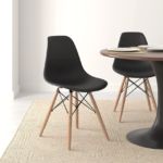Black Eames Plastic Chair, black plastic chair, Eames plastic chair, black Eames chair, Eames style plastic chair, black Eiffel chair, Eames molded plastic chair, modern plastic chair, black dining chair, iconic plastic chair, Mid-Century modern chair, Eames side chair, black molded chair, designer plastic chair, modern accent chair, black office chair, stylish dining chair, contemporary plastic chair, durable plastic chair, black accent chair, minimalist plastic chair, Eames replica chair, black shell chair, plastic armchair, black armchair, ergonomic plastic chair, modern cafe chair, restaurant plastic chair, commercial seating, black visitor chair, black reception chair, home office chair, desk chair, study chair, vanity chair, living room accent chair, dining room chair, retro plastic chair, molded shell chair, wooden leg plastic chair, Eiffel leg chair, metal leg plastic chair, stylish home seating, premium plastic chair, compact plastic chair, versatile seating, indoor plastic chair, outdoor plastic chair, modern home furniture, black plastic chair Kenya, Eames chair Kenya, Eames plastic chair Nairobi, black dining chairs Kenya, modern chairs Nairobi, office visitor chairs Kenya, designer furniture Kenya, plastic chairs supplier Nairobi, affordable Eames chair Kenya, durable office seating Kenya