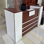 160cm Executive Reception Desk, executive reception desk, 160cm reception desk, reception counter, executive reception counter, modern reception desk, office reception desk, reception workstation, receptionist desk, front office desk, office counter desk, reception furniture, executive office furniture, modern office furniture, reception area furniture, office reception counter, 1600mm reception desk, 1600mm office desk, executive office desk, professional reception desk, stylish reception desk, contemporary reception desk, business reception desk, corporate reception desk, commercial reception desk, office front desk, customer service desk, reception workstation desk, reception table, office counter, reception counter desk, reception station, receptionist workstation, reception office furniture, modern reception counter, executive office counter, reception desk Kenya, reception counter Kenya, office desk Kenya, executive desk Kenya, office furniture Kenya, reception furniture Kenya, Nairobi reception desk, Nairobi office furniture, Kenya office furniture, corporate office desk, professional office desk, premium reception desk, durable reception desk, functional reception desk, spacious reception desk, compact executive desk, 160cm office reception counter, 1.6m reception desk, 1.6 meter reception desk, 160cm executive desk, executive front desk, modern front office furniture, office reception station, business front desk, commercial office furniture, reception room furniture, office lobby furniture, lobby reception desk, reception lobby counter, visitor reception desk, customer reception counter, receptionist counter, office customer service desk, contemporary office desk, stylish office counter, executive workstation, reception workstation furniture, office workstation desk, reception desk with storage, reception desk design, modern reception furniture, executive reception furniture, professional reception furniture, corporate reception furniture, office entrance desk, office lobby desk, business reception furniture, reception desk for offices, reception desk for companies, reception desk for hotels, reception desk for clinics, reception desk for schools, reception desk for institutions, reception desk for businesses, reception desk supplier Kenya, office furniture supplier Kenya, reception furniture supplier Kenya, executive office furniture Kenya, custom reception desk Kenya, modern reception desk Nairobi, executive reception desk Nairobi, 160cm reception furniture, 160cm executive reception counter, quality reception desk, durable office furniture, ergonomic reception workstation