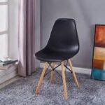 Black Eames Plastic Chair, black plastic chair, Eames plastic chair, black Eames chair, Eames style plastic chair, black Eiffel chair, Eames molded plastic chair, modern plastic chair, black dining chair, iconic plastic chair, Mid-Century modern chair, Eames side chair, black molded chair, designer plastic chair, modern accent chair, black office chair, stylish dining chair, contemporary plastic chair, durable plastic chair, black accent chair, minimalist plastic chair, Eames replica chair, black shell chair, plastic armchair, black armchair, ergonomic plastic chair, modern cafe chair, restaurant plastic chair, commercial seating, black visitor chair, black reception chair, home office chair, desk chair, study chair, vanity chair, living room accent chair, dining room chair, retro plastic chair, molded shell chair, wooden leg plastic chair, Eiffel leg chair, metal leg plastic chair, stylish home seating, premium plastic chair, compact plastic chair, versatile seating, indoor plastic chair, outdoor plastic chair, modern home furniture, black plastic chair Kenya, Eames chair Kenya, Eames plastic chair Nairobi, black dining chairs Kenya, modern chairs Nairobi, office visitor chairs Kenya, designer furniture Kenya, plastic chairs supplier Nairobi, affordable Eames chair Kenya, durable office seating Kenya